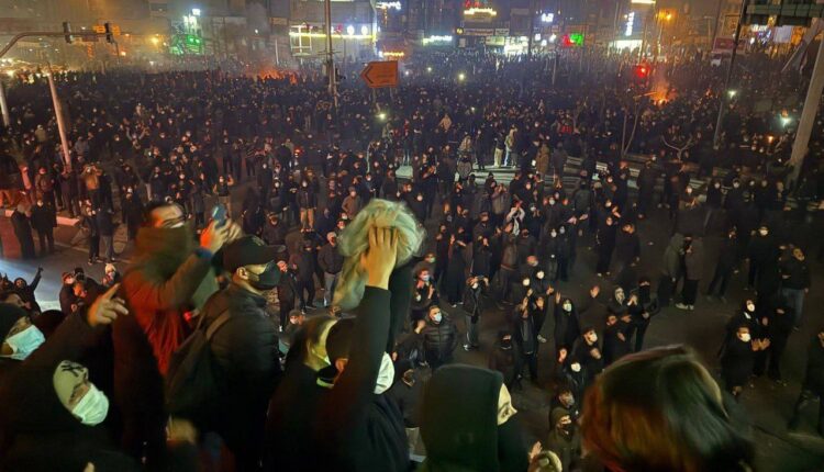 Large crowds attending a anti-regime protests in Tehran.